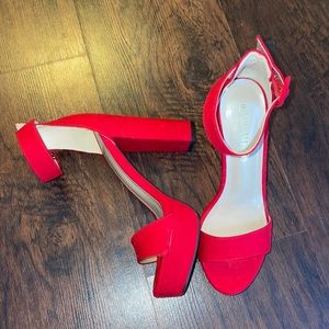 LIKE NEW. Red heels size 7 from Amazon. More like size 7.5-8